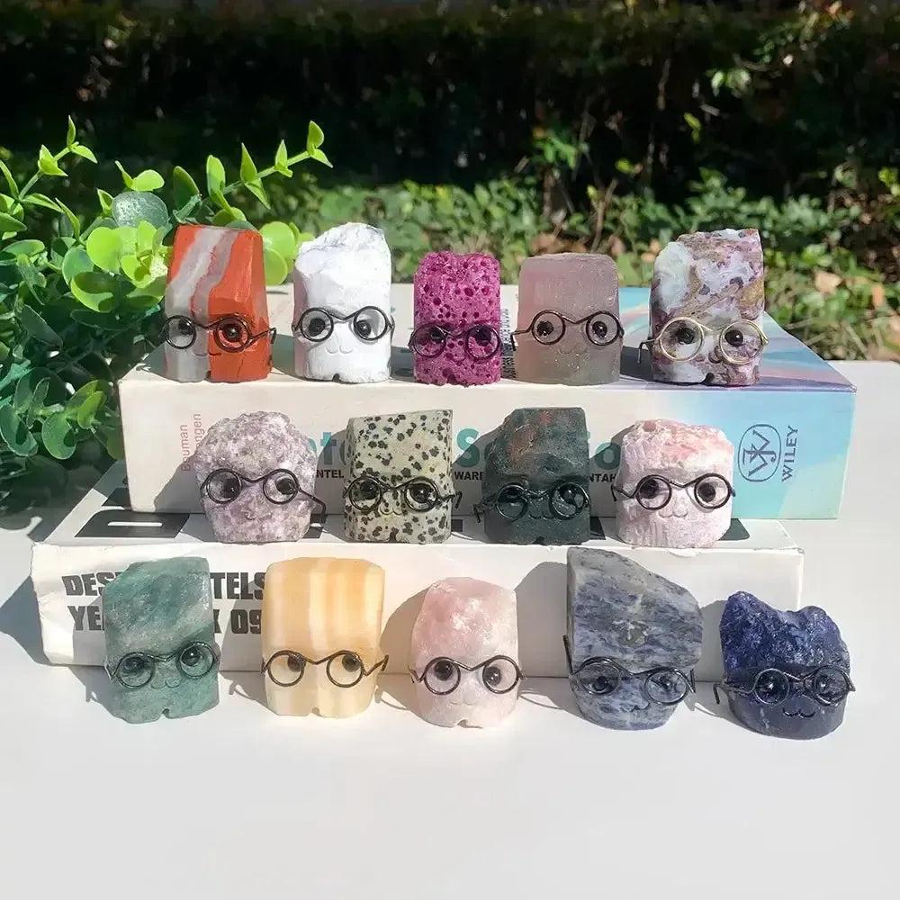 Assorted Crystal Destiny pet figurines with tiny glasses, carved from natural cluster, mica, and rough stones.