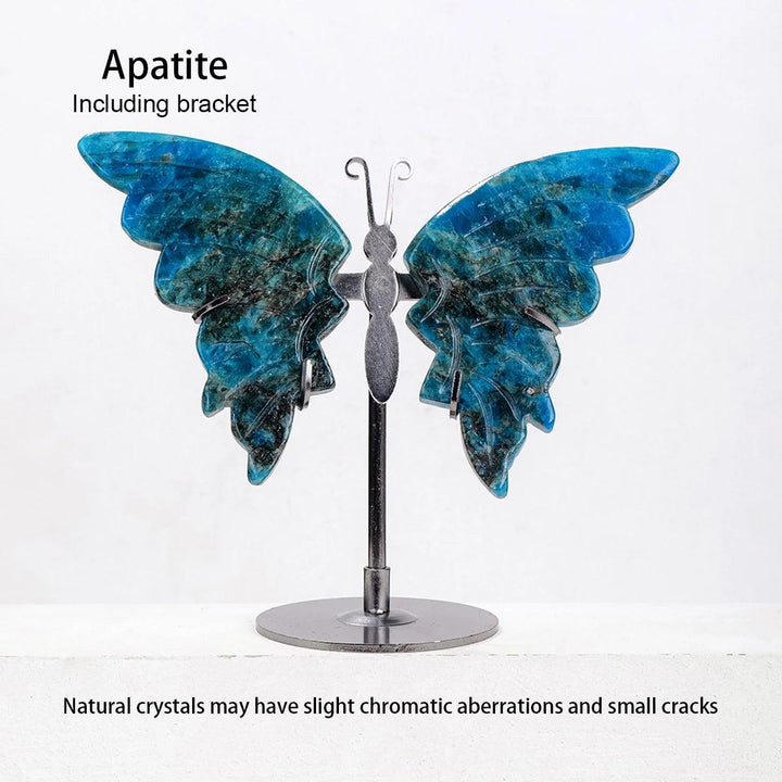 Polished Apatite crystal butterfly wings, vibrant blue with dark inclusions, on a silver metal stand.