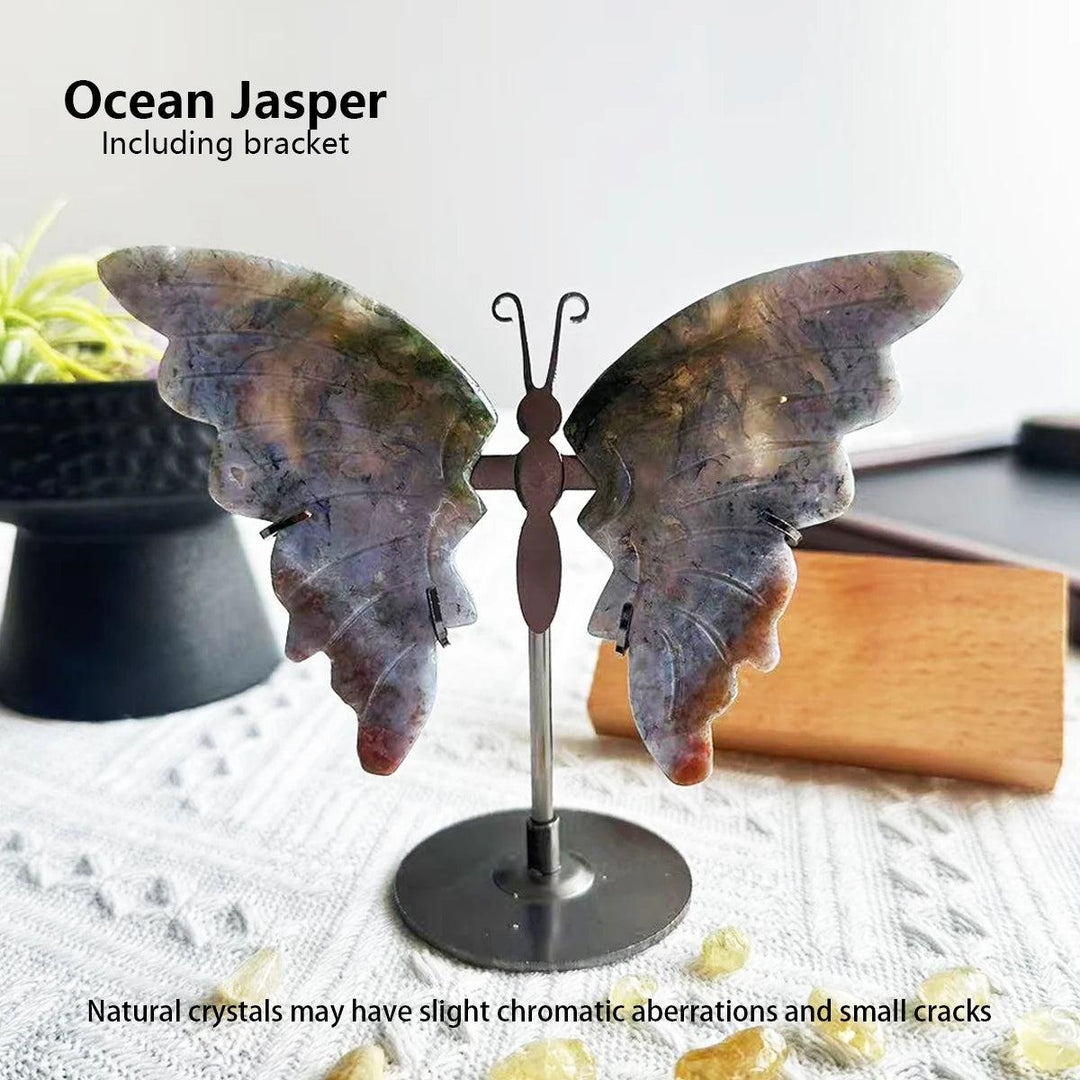 Polished Ocean Jasper butterfly wings on a metal stand, showcasing natural blue, green, and brown swirls.