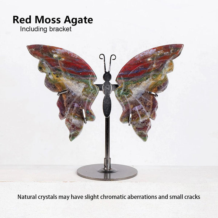 Polished Red Moss Agate crystal butterfly wings with earthy red, green, and white hues on a black metal stand.