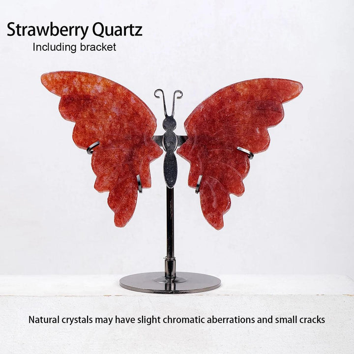 Polished Strawberry Quartz crystal butterfly wings, vibrant red with natural inclusions, displayed on a black metal stand.