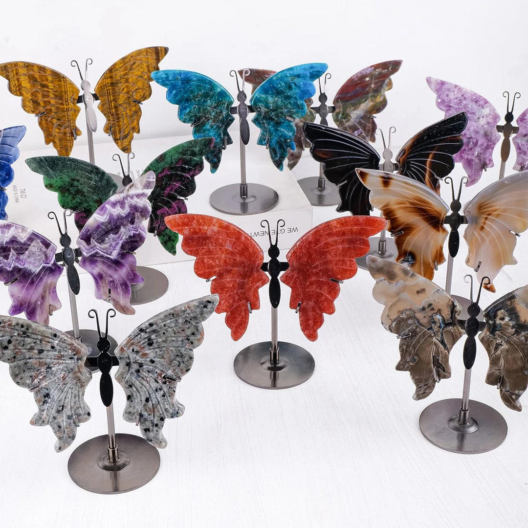 Assortment of polished crystal butterfly wings in various natural stones like Agate, Amethyst, and Tiger Eye.