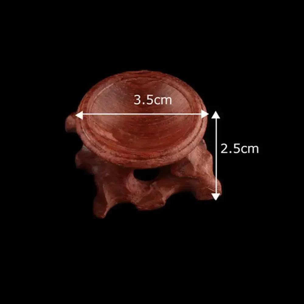 Elegant dark brown wooden crystal sphere display stand, 3.5cm wide, 2.5cm tall, for gemstones and miniature stones.
