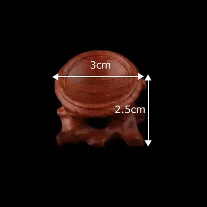 Elegant 3cm wide, 2.5cm tall carved dark wood sphere display stand for crystal spheres and gemstones.
