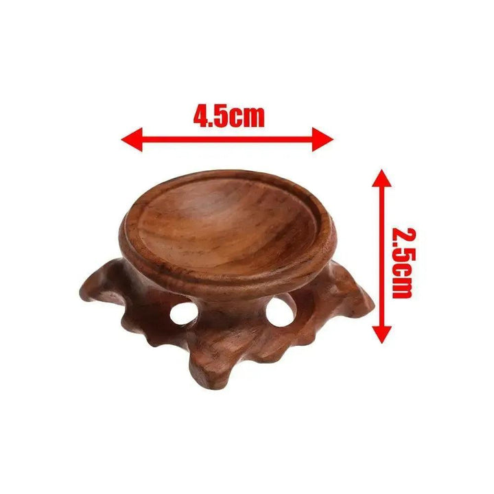 Elegant dark brown carved wooden crystal sphere display stand, 4.5cm wide, 2.5cm tall.