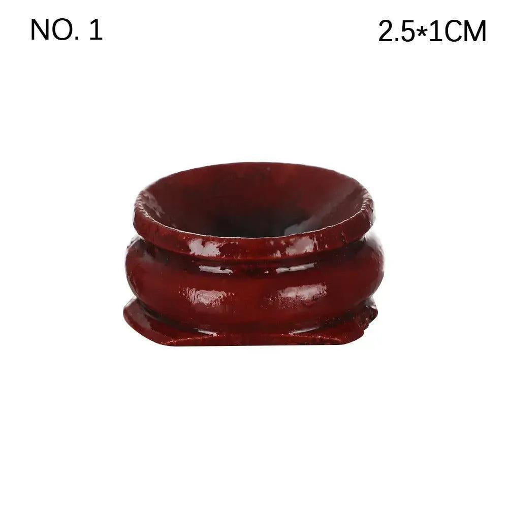 Elegant dark red wooden sphere display stand, 2.5x1cm, for crystal spheres, gemstones, or miniature stones.