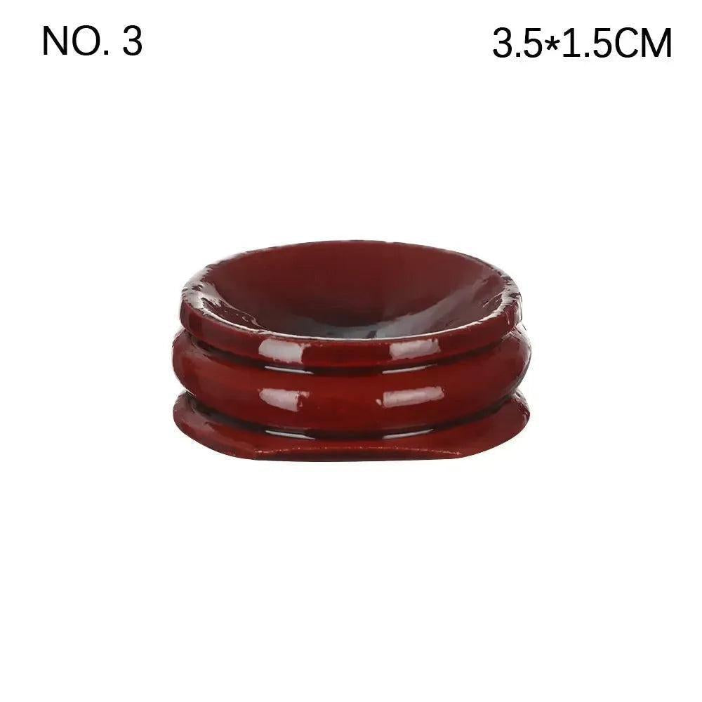 Elegant dark red resin crystal sphere display stand, 3.5x1.5cm, for showcasing gemstones and enhancing décor.