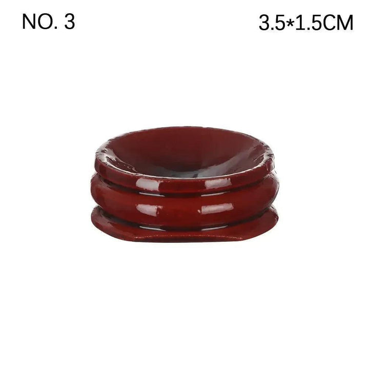 Elegant dark red resin crystal sphere display stand, 3.5x1.5cm, for showcasing gemstones and enhancing décor.