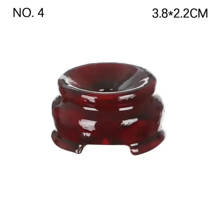 Elegant dark red resin crystal sphere display stand, 3.8x2.2cm, perfect for showcasing gemstones and enhancing décor.