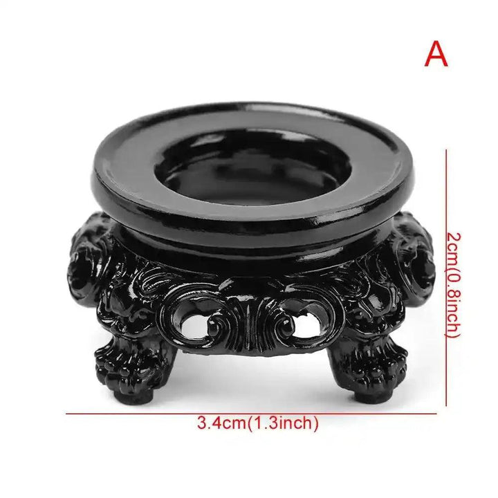 Elegant black carved wood crystal sphere display stand, 3.4cm wide, perfect for showcasing gemstones.