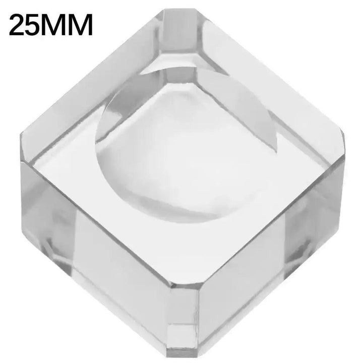 25mm clear acrylic crystal sphere display stand, square with a concave holder, elegantly showcasing gemstones.