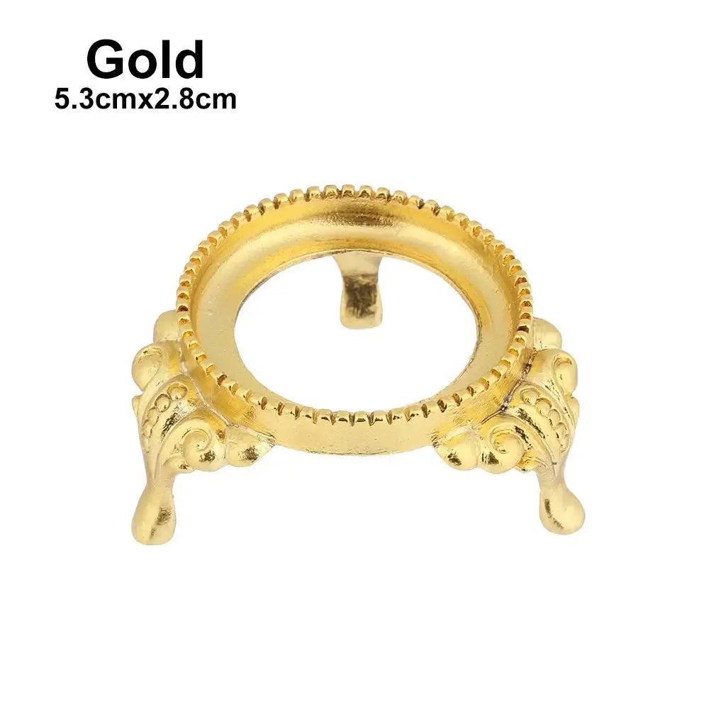 Elegant gold metal sphere display stand, 5.3cmx2.8cm, with intricate detailing for crystal spheres and gemstones.