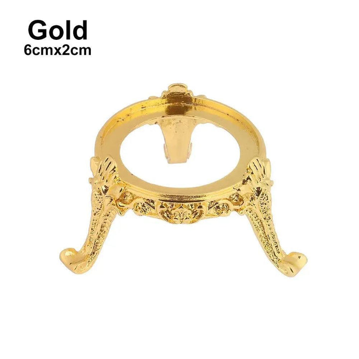 Elegant gold metal sphere display stand, 6cmx2cm, with ornate scrollwork, perfect for showcasing crystal spheres.