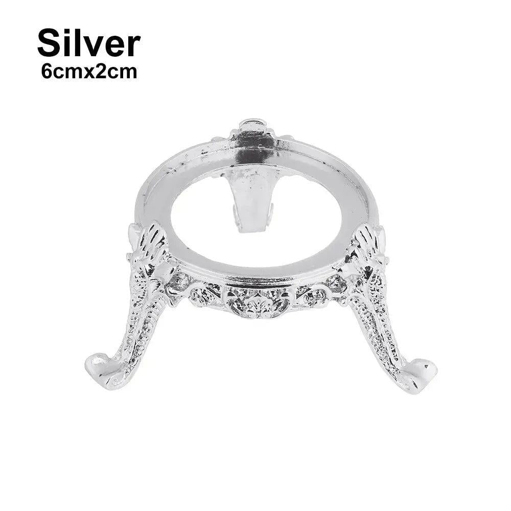 Elegant silver metal crystal sphere display stand, 6cmx2cm, showcasing intricate details for gemstones.