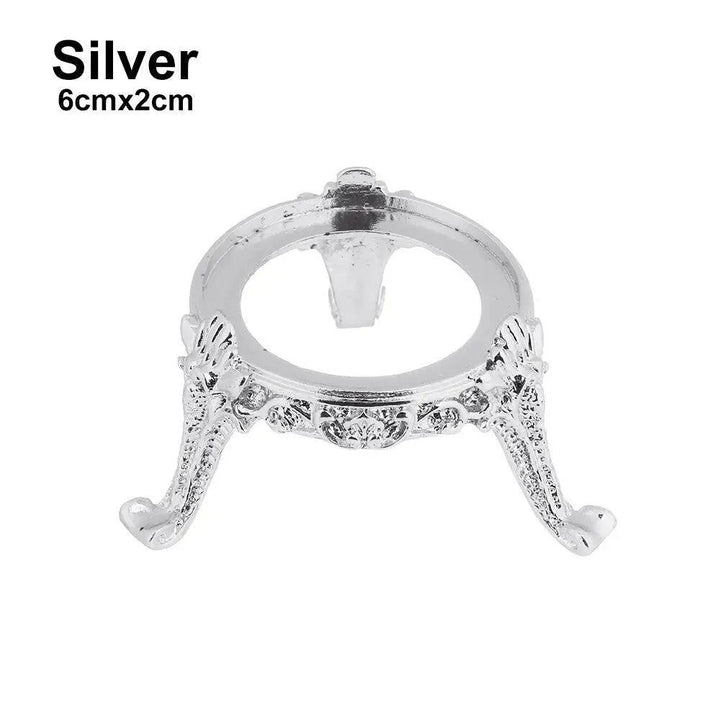 Elegant silver metal crystal sphere display stand, 6cmx2cm, showcasing intricate details for gemstones.