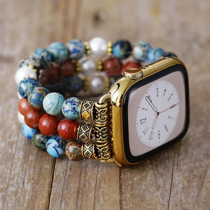 Apple Watch band with natural jasper and matte quartz crystal beads, gold accents, and a boho design.