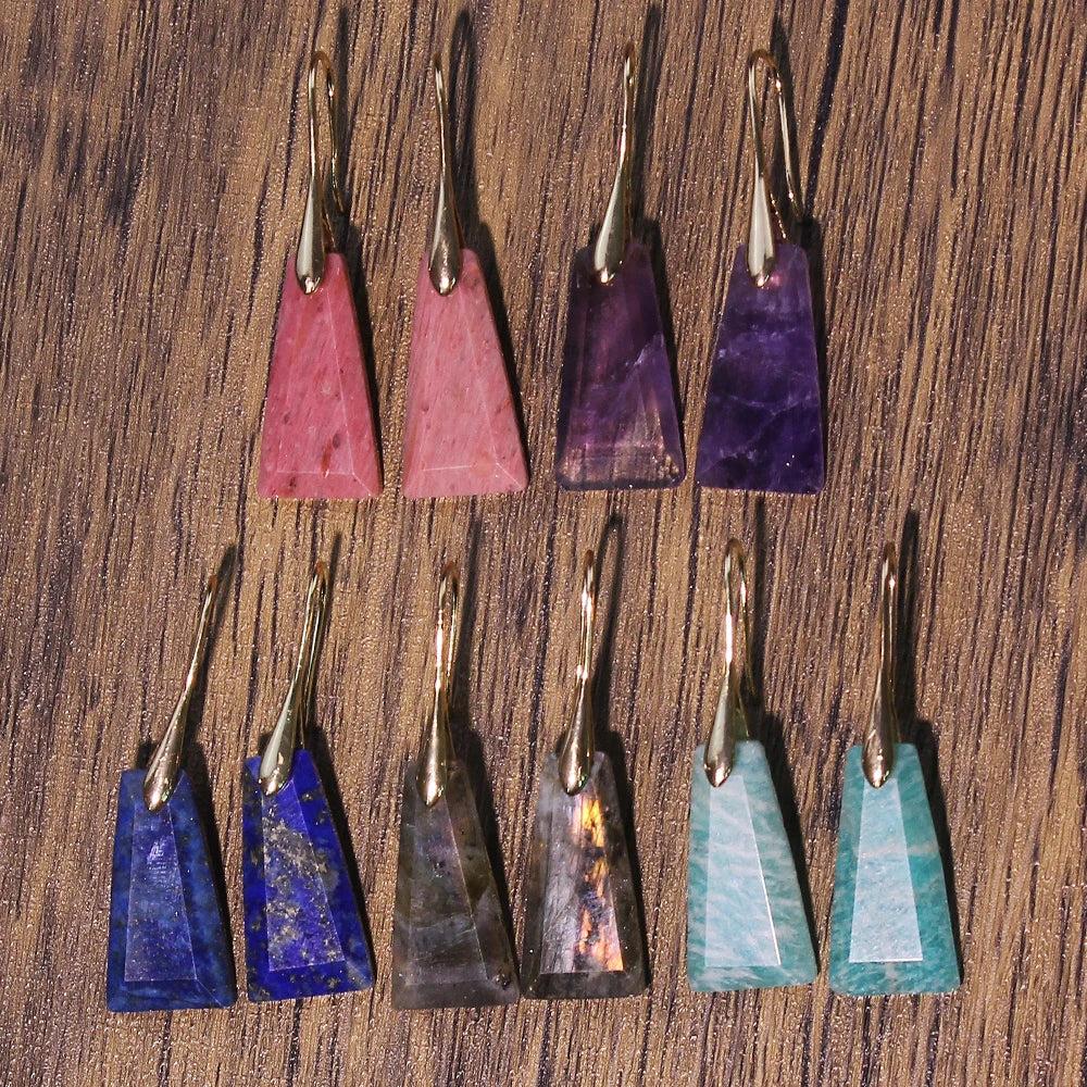 Faceted crystal stone drop earrings in various colors like amethyst, amazonite, lapis lazuli, rhodochrosite, and labradorite.