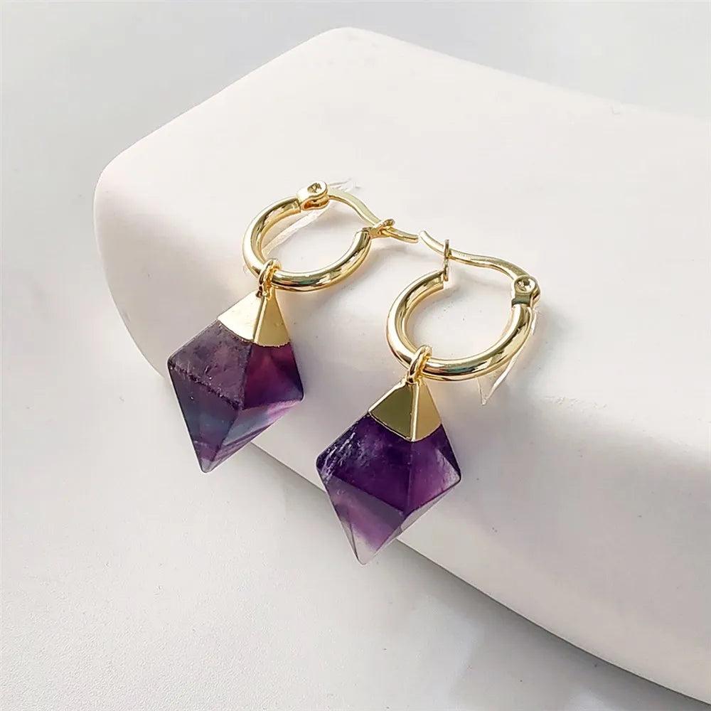 Fluorite Crystal Stone Hoop Earrings. Gold hoops with faceted purple fluorite for spiritual clarity.