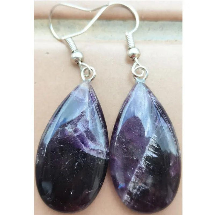Amethyst Crystal Stone Teardrop Drop Earrings. Deep purple genuine crystal for intuition and clarity, set in copper wire.