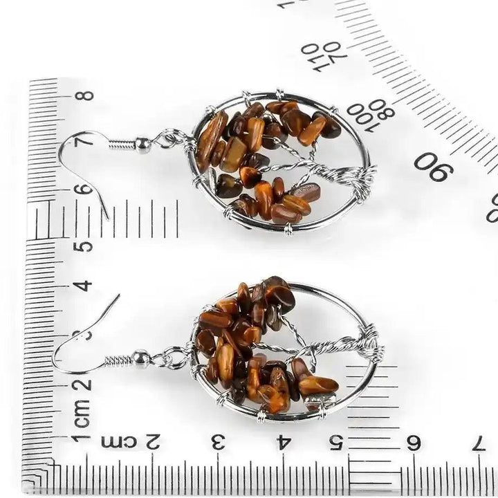 Tree of Life Crystal Drop Earrings with natural brown tiger's eye gemstones, symbolizing growth and positive energy.