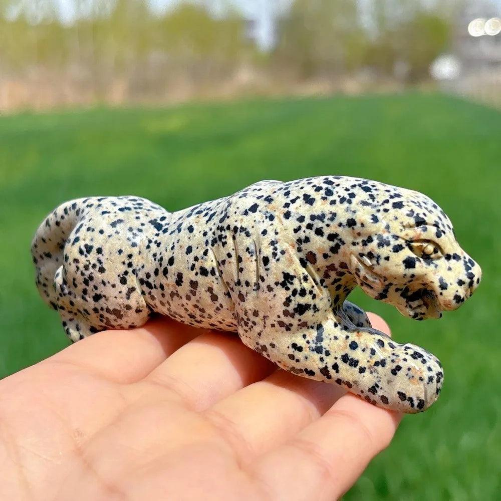 Hand-carved Dalmatian Jasper leopard crystal for grounding, featuring a playful spotted pattern and detailed design.