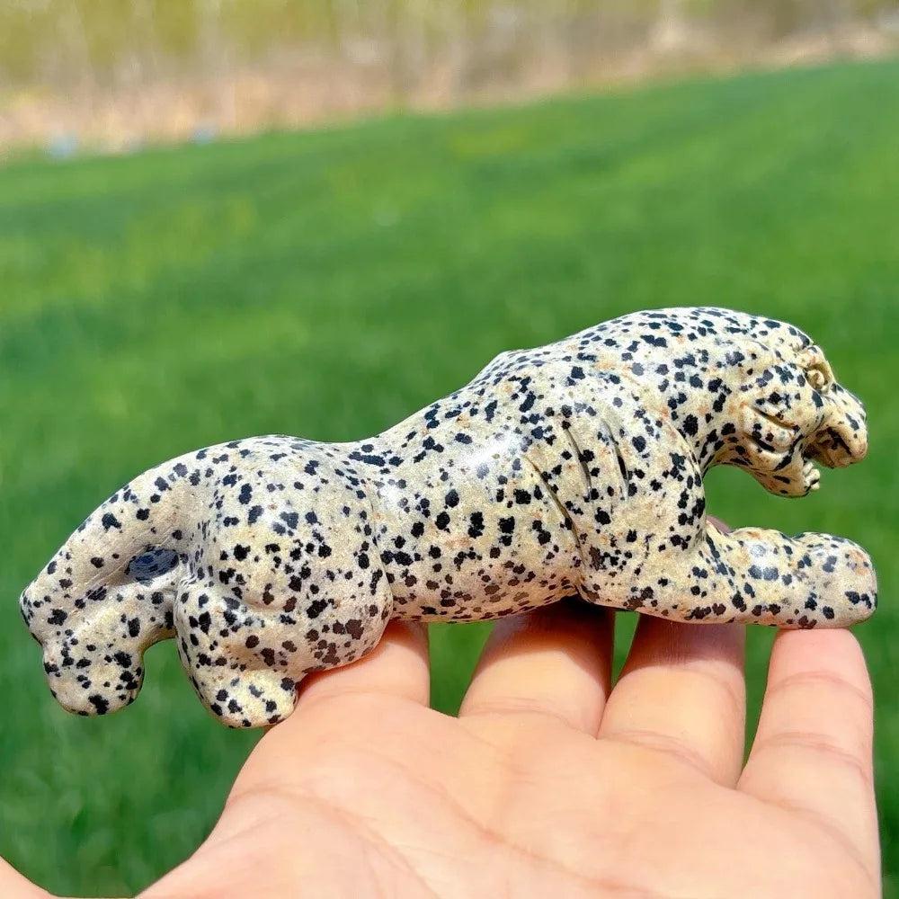 Hand-carved Dalmatian Jasper leopard crystal for grounding, featuring a playful spotted pattern and detailed design.