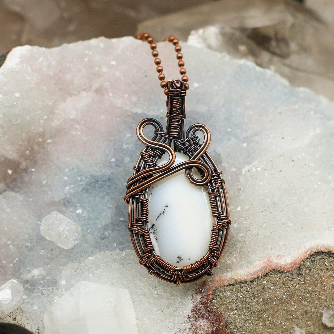 Dendritic Agate Wire Wrap Pendant, 2.75" handcrafted in healing copper, featuring a unique white stone with dark tree-like patterns.