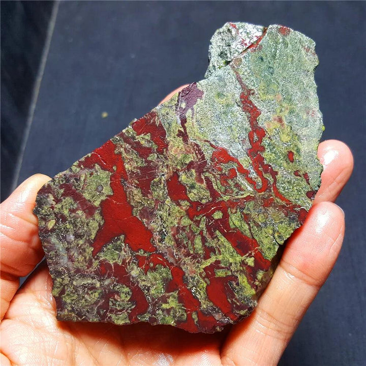 Polished Dragon Blood Jasper Crystal Slice with vibrant green and red veins for grounding and courage.
