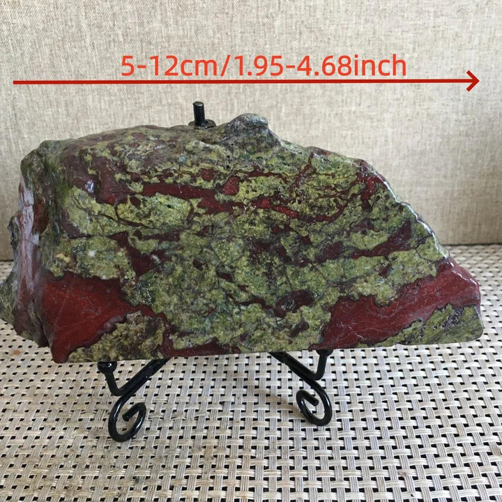 Polished Dragon Blood Jasper freeform slice with green and red veins on a display stand.