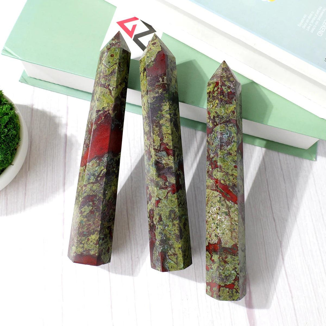 Three natural dragon blood stone crystal wands, 15-17cm, with green and red patterns, pointed obelisk tower decor.