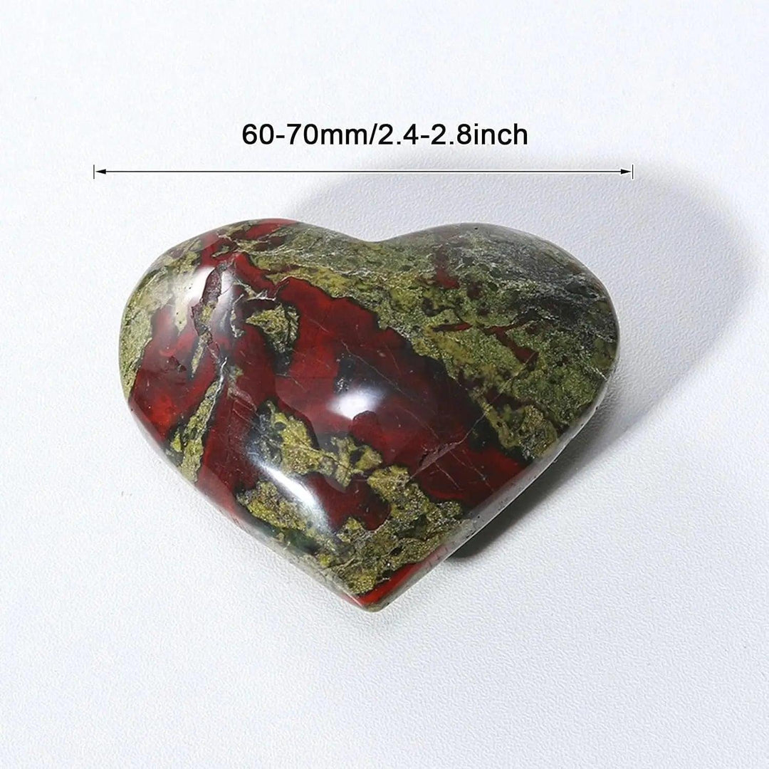 Polished green and red dragon bloodstone crystal heart worry stone for spiritual healing.