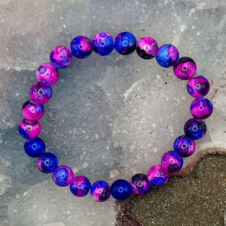 Dragon Veined Dyed Agate Bracelet with vibrant blue and pink crackle-patterned beads for grounding energy.