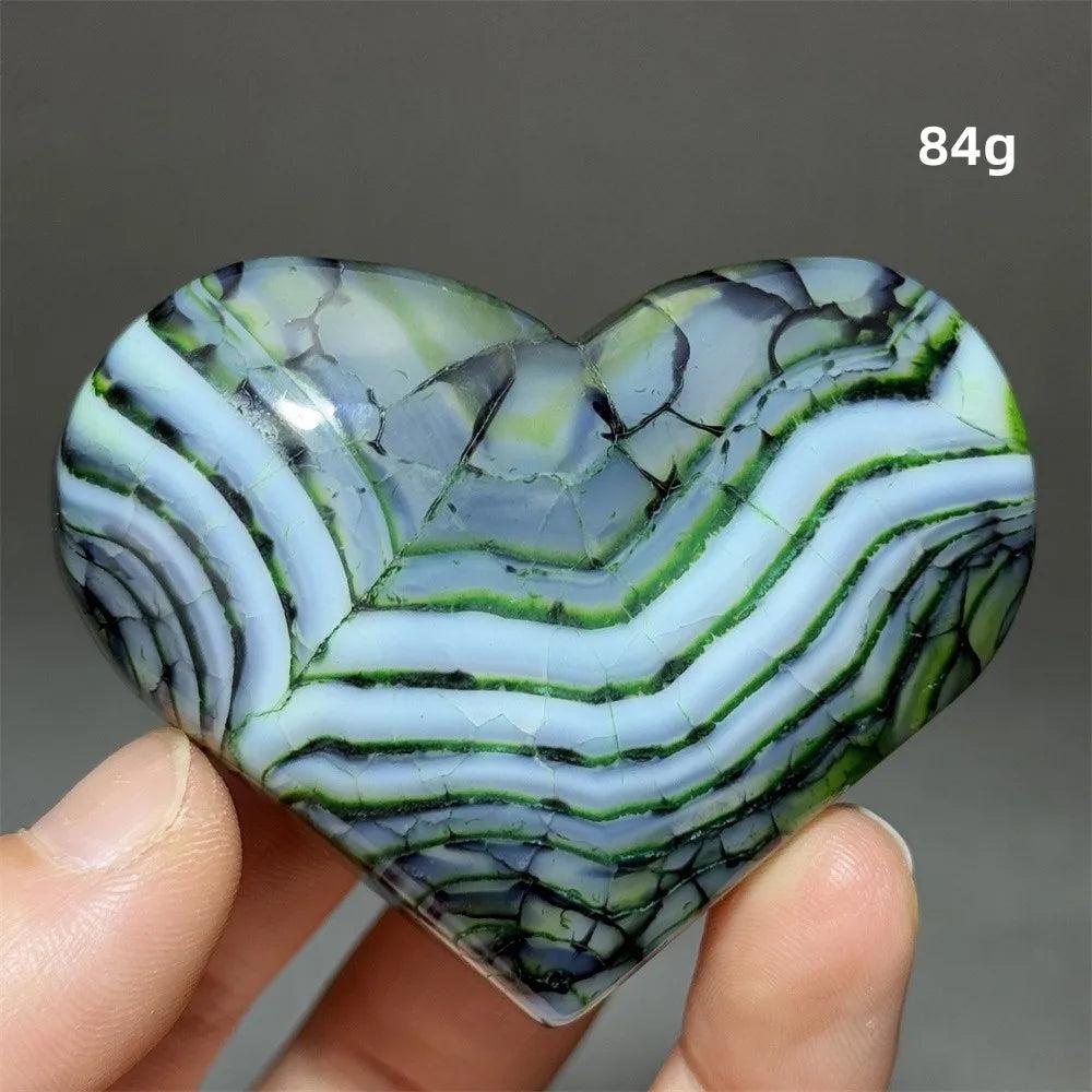 Dragon Veined Pattern Agate Crystal Heart, 84g, with vibrant green, blue, and black swirling bands for grounding and protection.