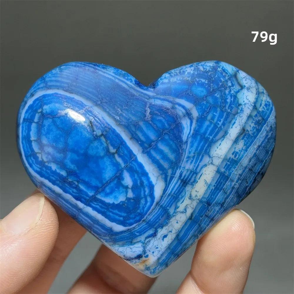 Vivid blue Dragon Veined Agate crystal heart, 79g, with swirling white patterns for grounding and confidence.