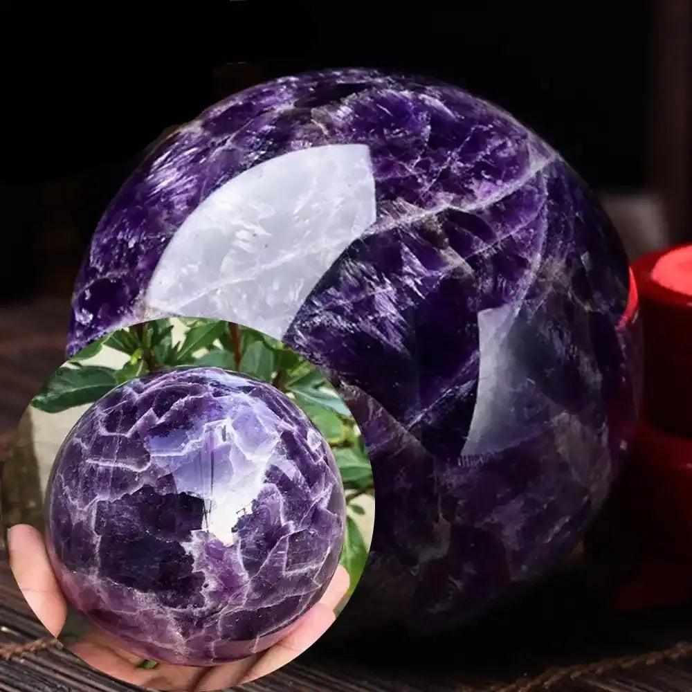 Polished Dream Amethyst crystal sphere featuring deep purple hues, natural white banding, and calming meditation energy.