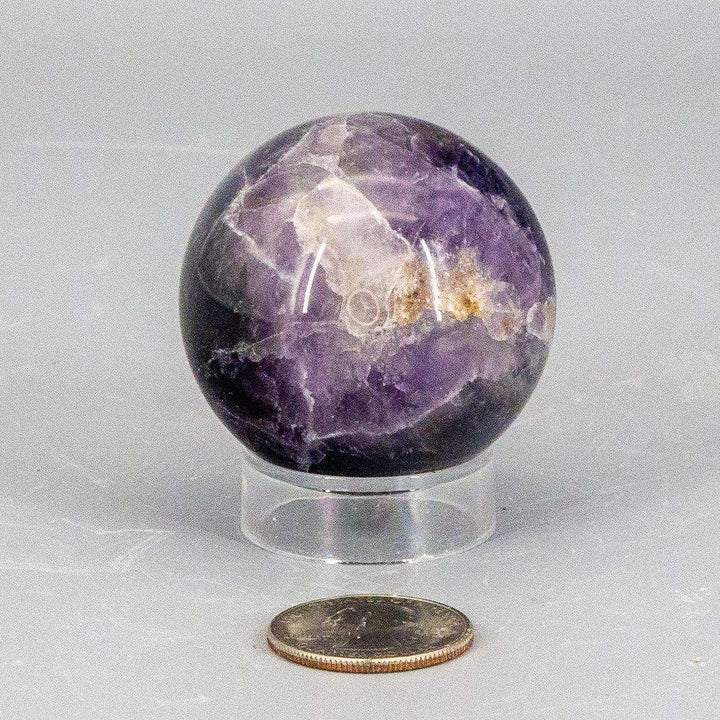 Dream Amethyst Sphere, 49mm, showcasing layered purple and white banding for a visually soft, complex look.