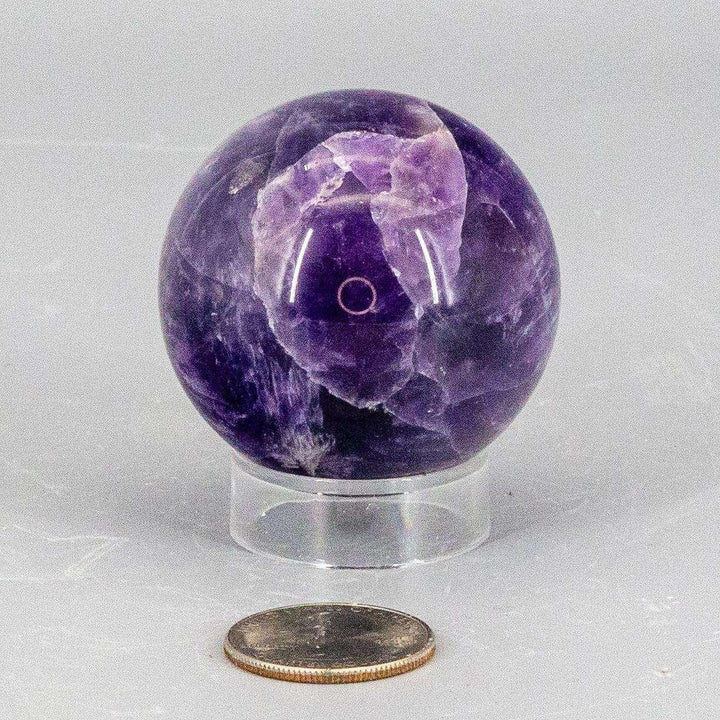 Dream Amethyst Sphere, 49mm, showcasing layered purple Amethyst and white Quartz banding for a dreamy appearance.