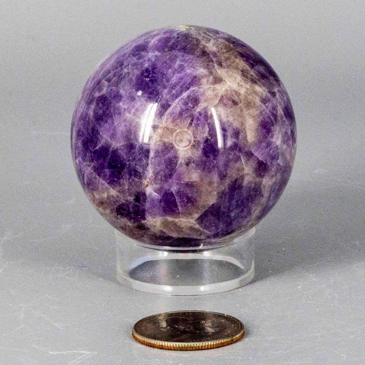Dream Amethyst Sphere, 51-57mm, showcasing soft purple and white bands for calming energy and restful sleep.