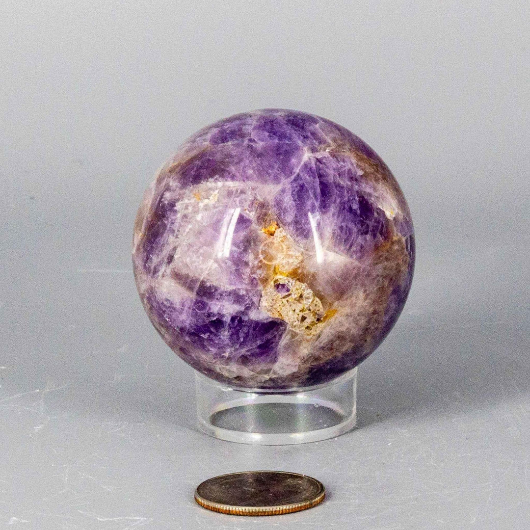 Dream Amethyst Sphere, 51-57mm, showcasing soft purple and white bands for calming energy and restful sleep.