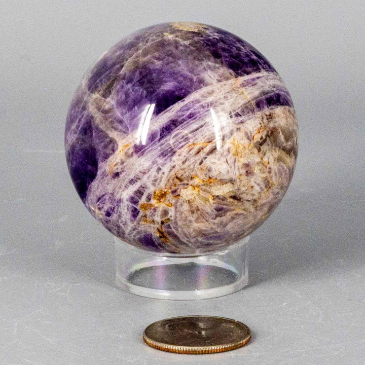 Dream Amethyst Sphere, 51-57mm, showcasing soft purple and white bands, ideal for calming energy and dream work.