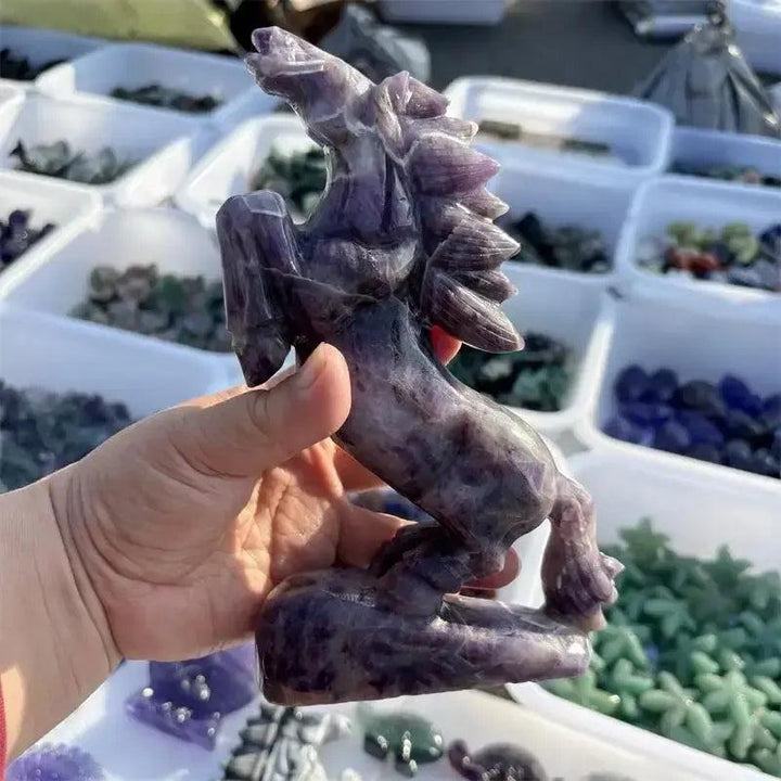 Hand-carved Dream Amethyst horse figurine by Crystal Destiny, featuring purple and white chevron patterns.