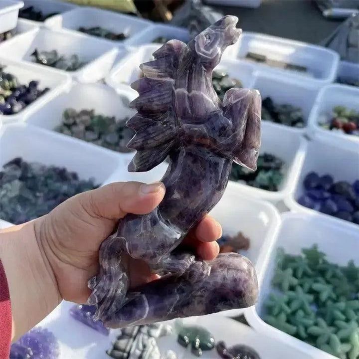 Hand-carved Dream Amethyst horse figurine by Crystal Destiny, featuring purple and white chevron patterns.