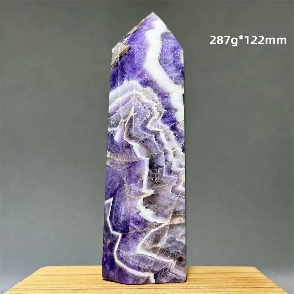 Dream Amethyst polished obelisk tower featuring lavender, purple, and white chevron patterns for crown chakra healing.
