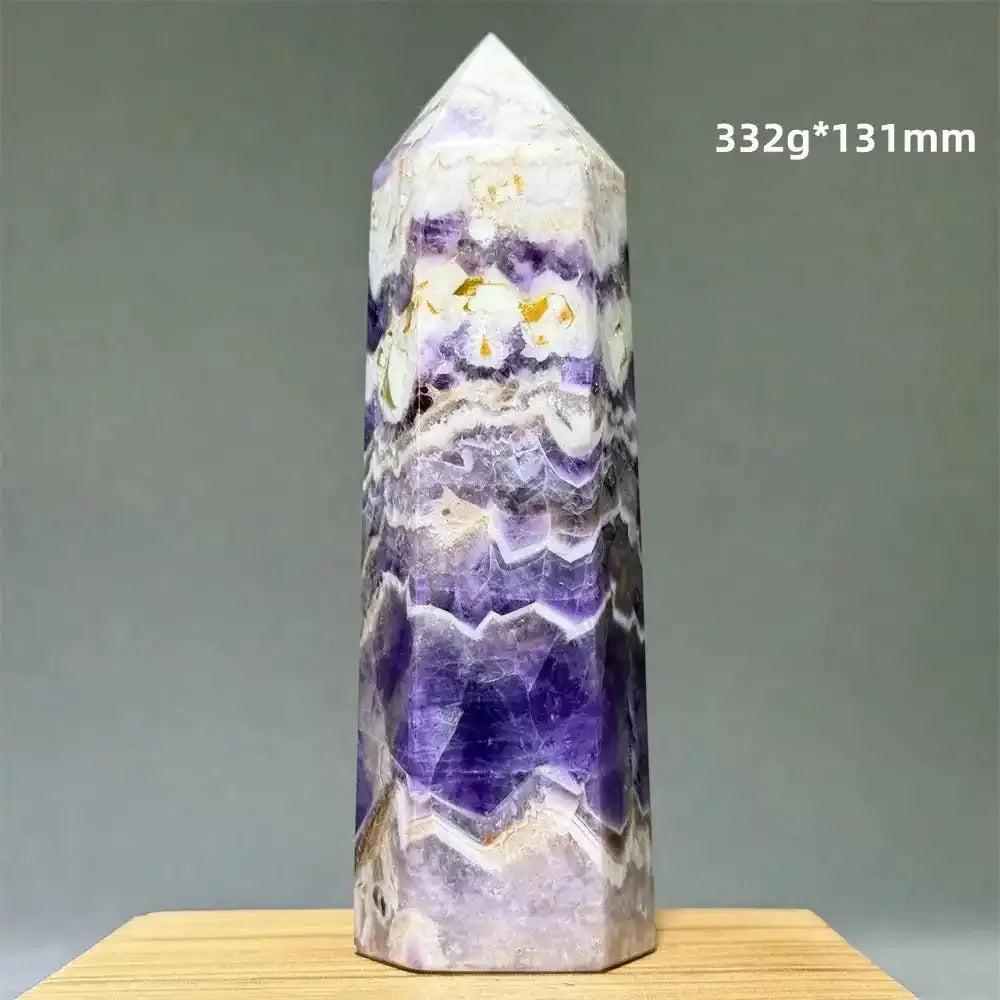 Dream Amethyst polished obelisk tower featuring lavender and deep purple chevron patterns with gold accents, 131mm tall.