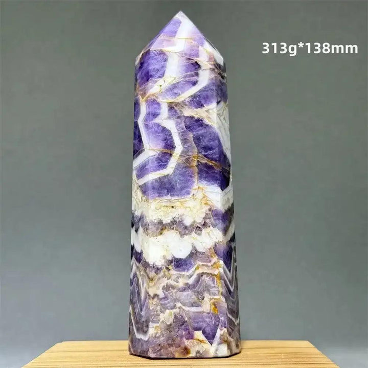 Dream Amethyst polished obelisk tower with lavender, purple, and white chevron patterns for crown chakra meditation.