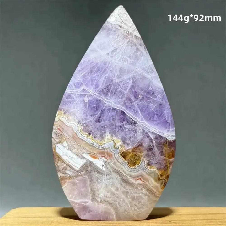 Polished Dream Amethyst torch freeform with deep purple and white quartz banding for meditation and intuition.