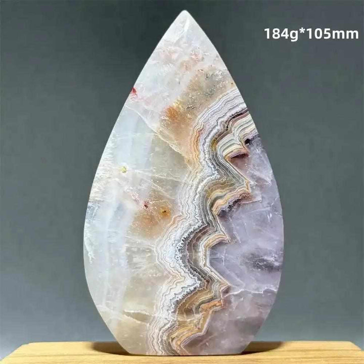 Polished Dream Amethyst torch freeform featuring swirling purple and white quartz bands for Third Eye Chakra meditation.