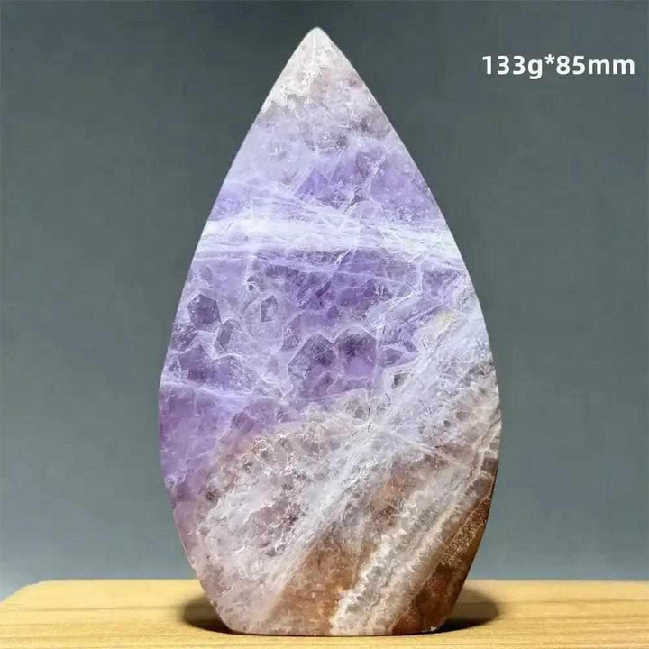 Polished Dream Amethyst torch freeform featuring deep purple and white quartz swirls for meditation and intuition.