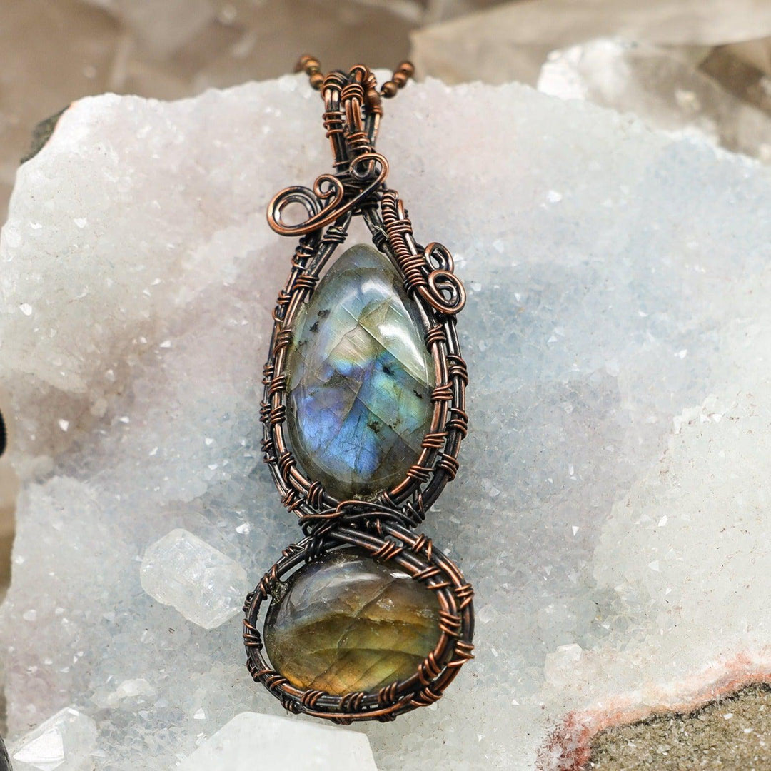 Dual Labradorite Wire Wrap Pendant: Handcrafted copper wire embraces two genuine Labradorite crystals with blue-green flash.