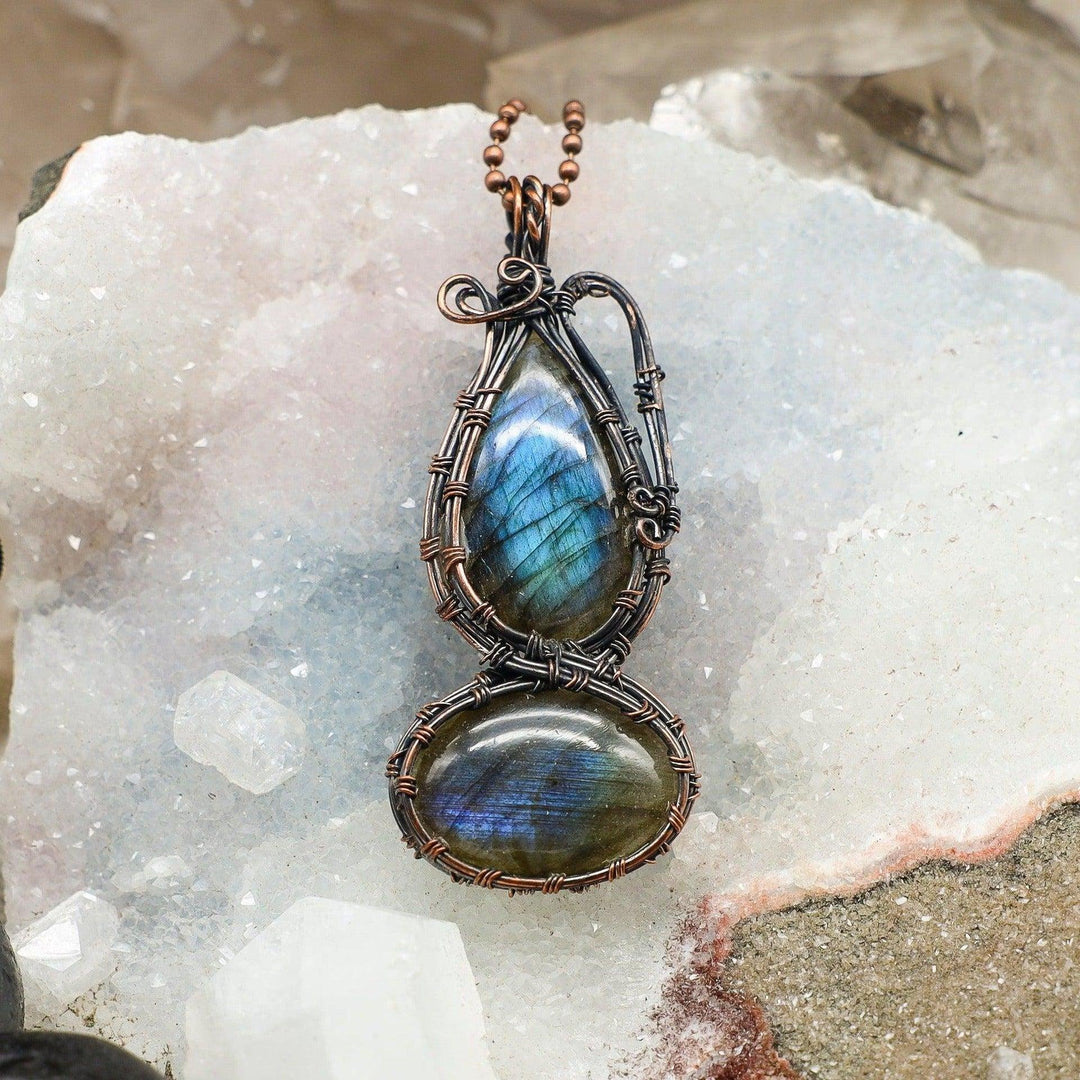 Dual Labradorite Wire Wrap Pendant with mystical blue-green flash, handcrafted copper, for transformation and intuition.